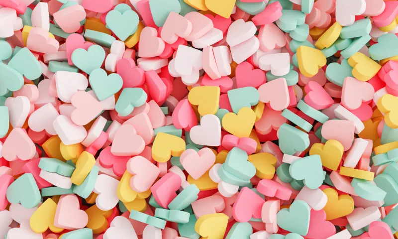 colorful background of many stacked heart shaped pills 3d rendering