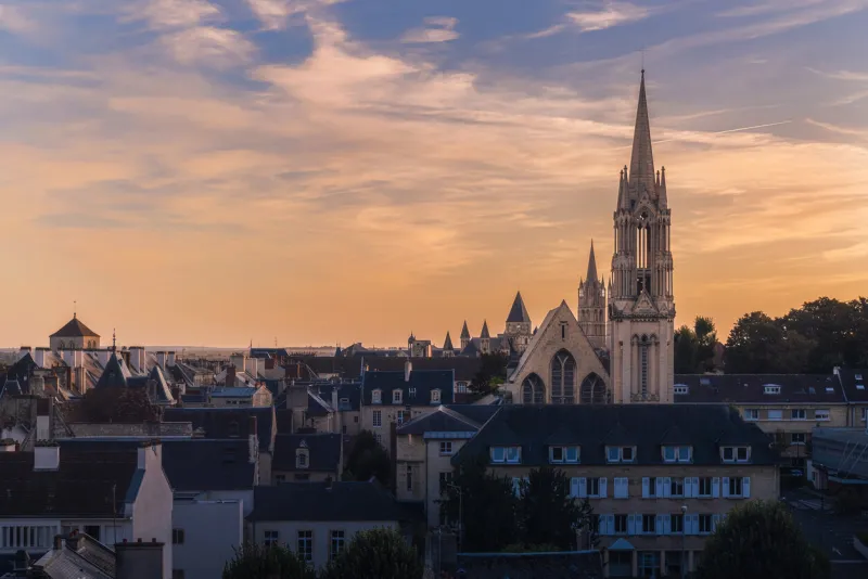caen aerial cityscape, normandy, france beautiful sunset view on old town of caen with church and rooftops popular touristic destination