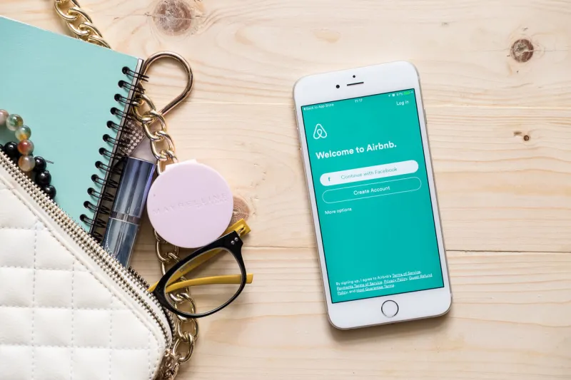 chiang mai, thailand - september 4, 2016  apple iphone 6s plus with airbnb application on the screen airbnb is a website for people to list, find, and rent lodging