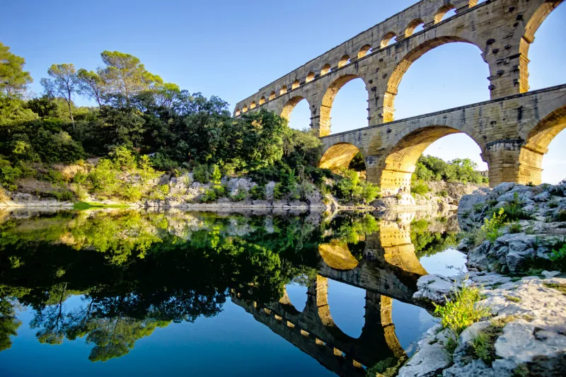 the three-tiered pont du gard aqueduct preserved from the time of the roman empire on the gardon river near avignon, provence, france
