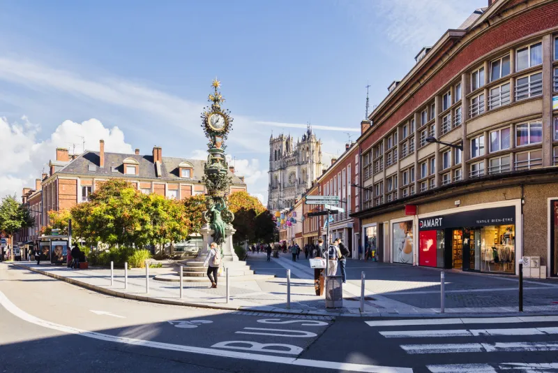 amiens, france - september 28, 2022  street view with amiens cathedral in the background amiens is the capital of the somme department and has an important historical and cultural heritage