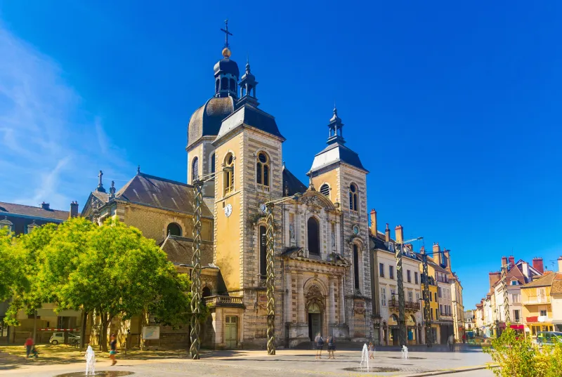 view of impressive medieval church of st peter, former benedictine chapel on chalon-sur-saone square in summer, france