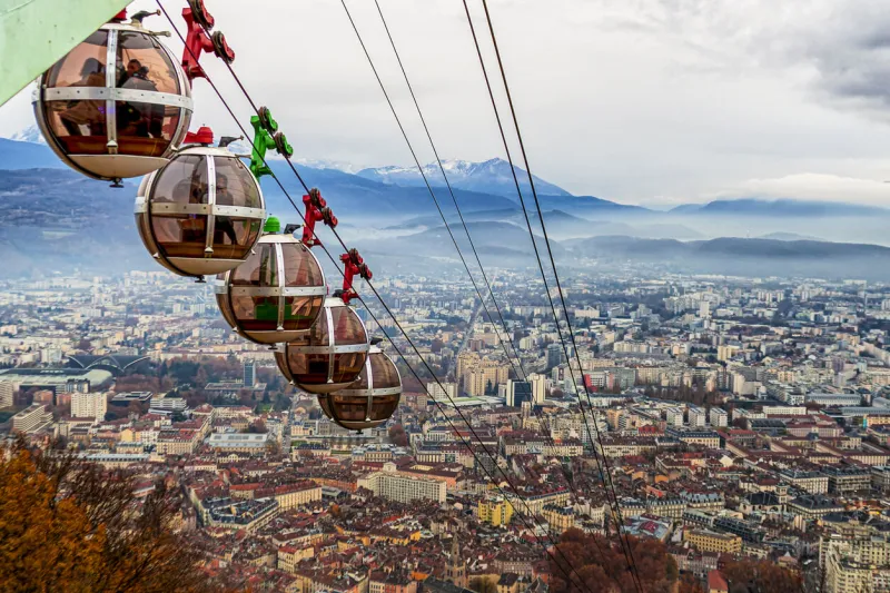 view of grenoble from the heights of the bastille grenoble is nicknamed the capital of the alps and is famous for its mountain ranges and its bubble-shaped cable car
