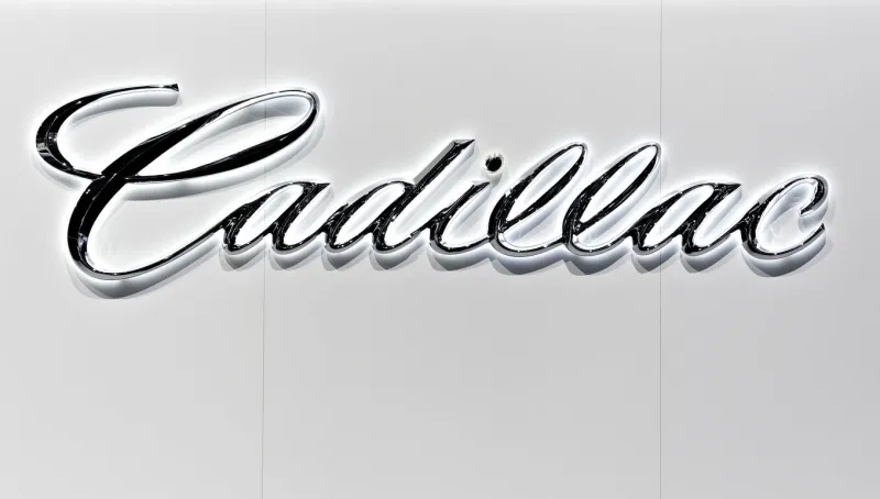 frankfurt, germany - september 14th, 2011  company logo on the wall of the cadillac stand on frankfurt motor show cadillac is an american luxury vehicle marque owned by general motors (gm)