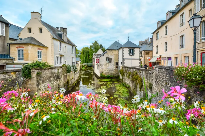 picturesque spot on a bridge overlooking the aure river in the picturesque village of bayeux in the normandy region of france