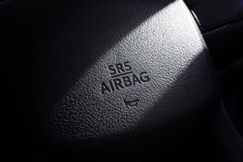 srs airbag icon on steering wheel in a car