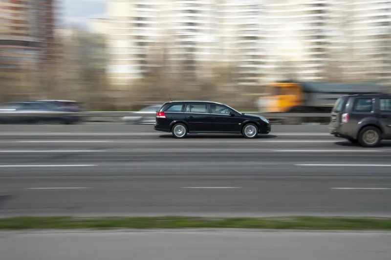 ukraine, kyiv - 6 april 2021  black opel signum car moving on the street editorial