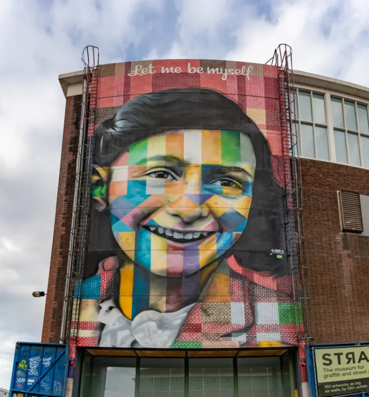 amsterdam, netherlands - october 15, 2022  a picture of the let me be myself colorful mural, depicting anne frank, created by eduardo kobra in