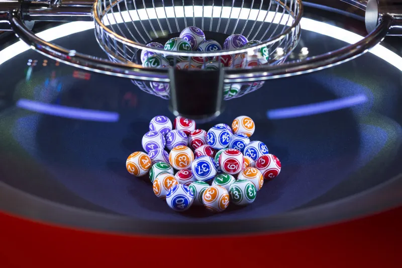 colourful lottery balls in a rotating bingo machine