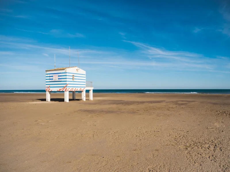 post rescue on the deserted french gruissan beach on a sunny day