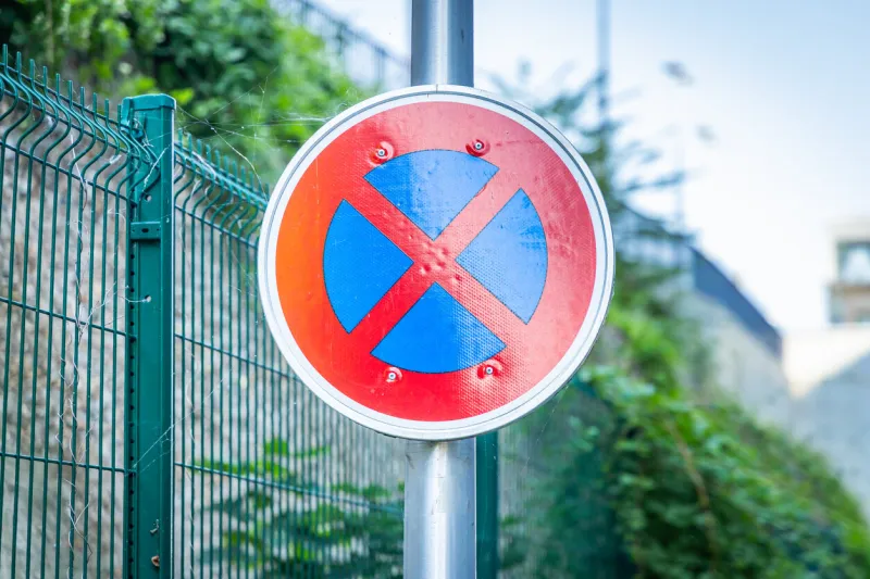 paris, france - september 09, 2023   no stopping and no parking sign in a street of paris, france
