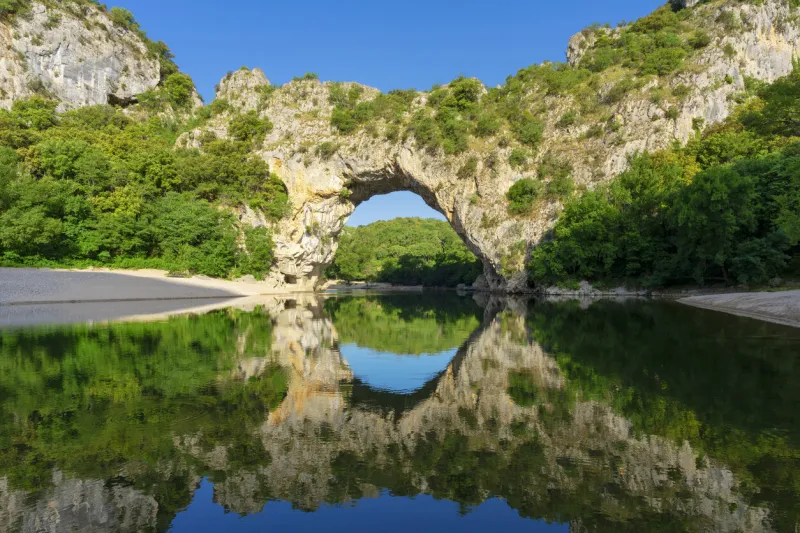 beautiful view of famous arch at vallon-pont-d'arc, ardeche, france