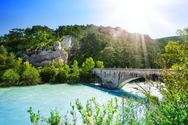 bridge over le verdon river in south french alps mountains