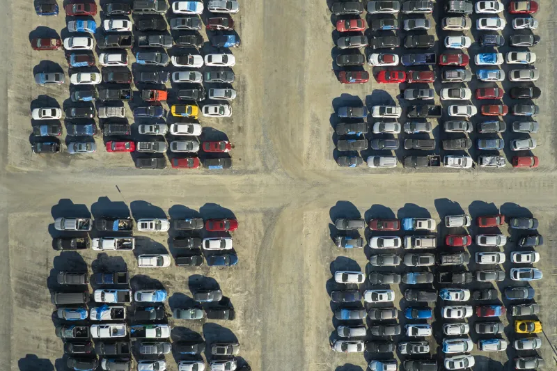 used damaged cars on auction reseller company big parking lot ready for resale services sales of secondhand vehicles for rebuilt or salvage title