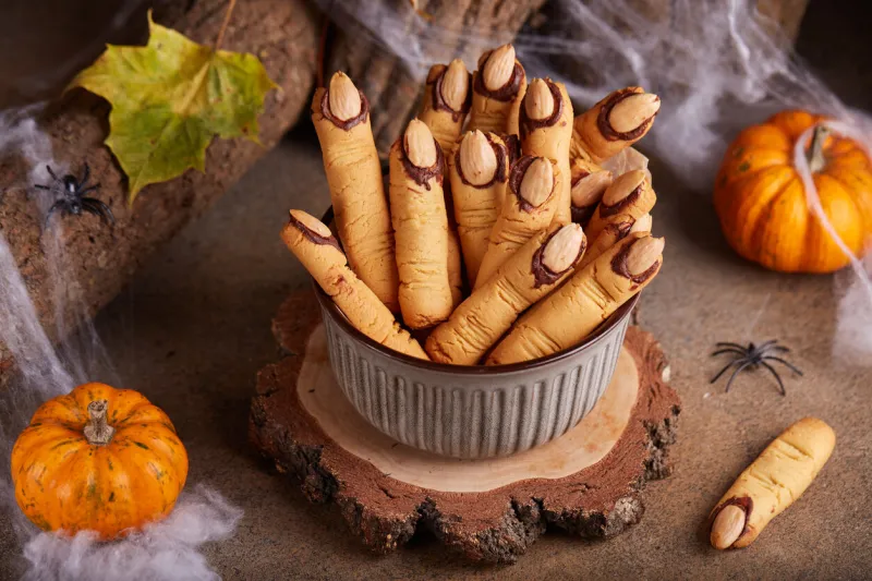 halloween cookies witch's fingers with chocolate and almond nuts delicious and scary dessert for treats