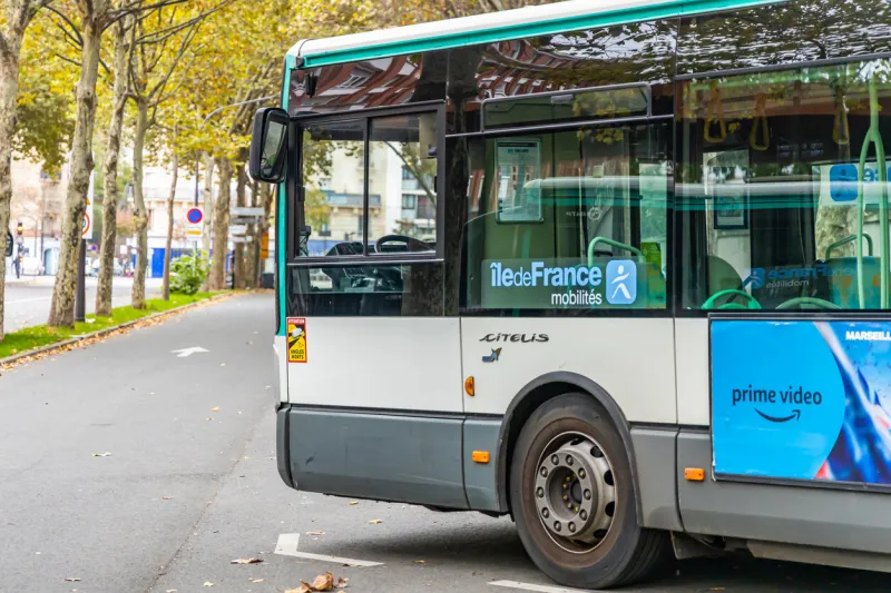 ratp bus parked on a parisian street in paris, france
