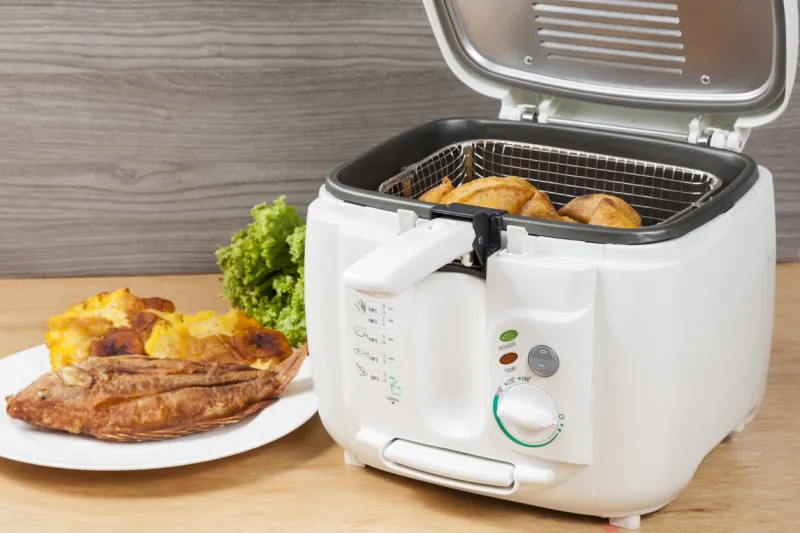 household kitchen - a white automatic electric fryer pot