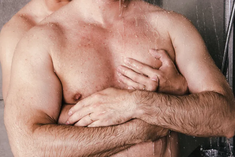 early morning an adult gay couple showers together love and romantic relationship between two men