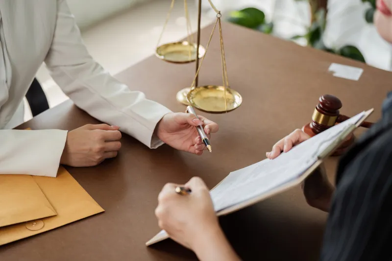 lawyer, legal advisor, businessperson explaining agreement details business contracts