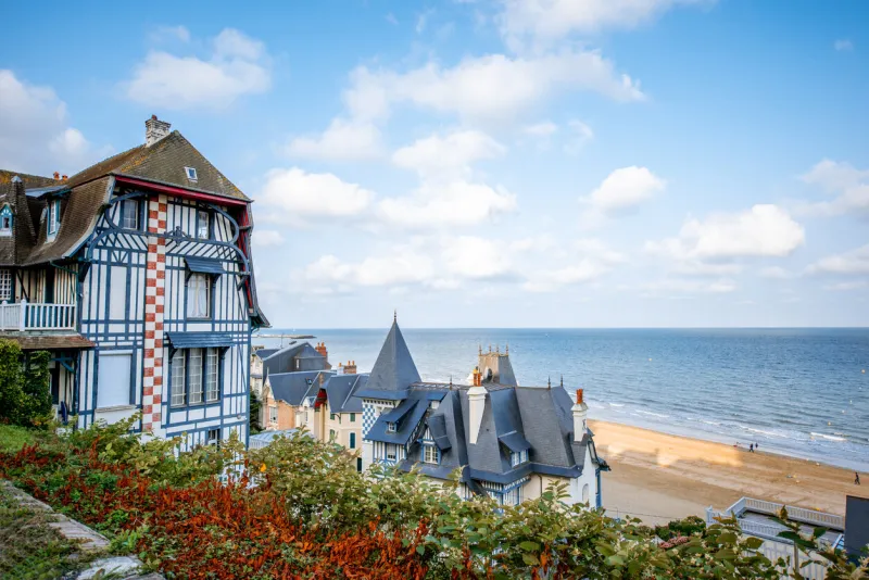 top view of trouville city with luxury houses and beautiful beach on the background during the morning light in france