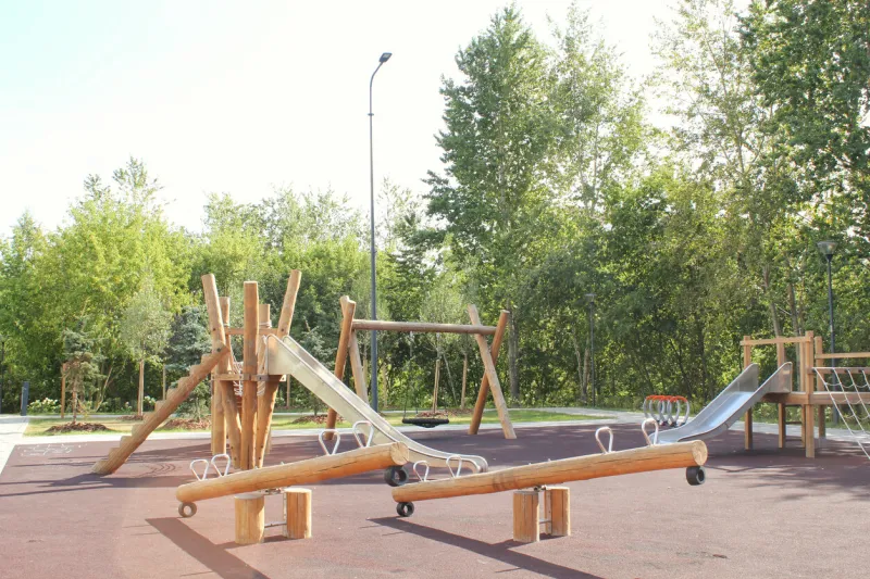 wooden modern ecological safety children outdoor playground equipment in public park nature architecture construction playhouse in city children rest and childhood concept idea for games on air