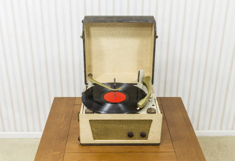 vintage turntable with red record album