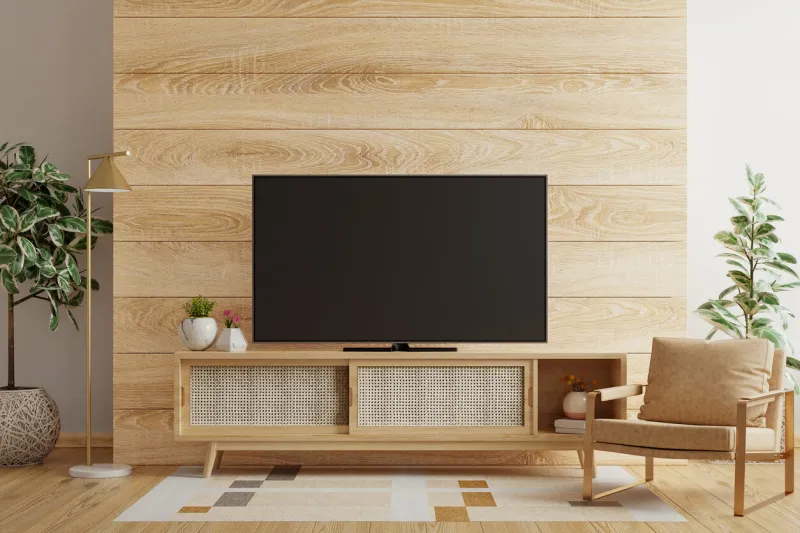 wooden wall in living room with armchair and accessories,tv room3d rendering