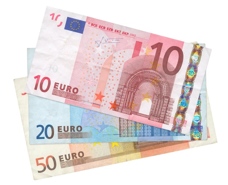 close-up of three euro banknotes isolated on white background, see also