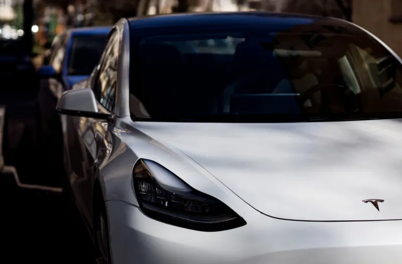 minsk, belarus, april 2023 - electric car tesla model 3 the body of a electric car hood, headlamp, front