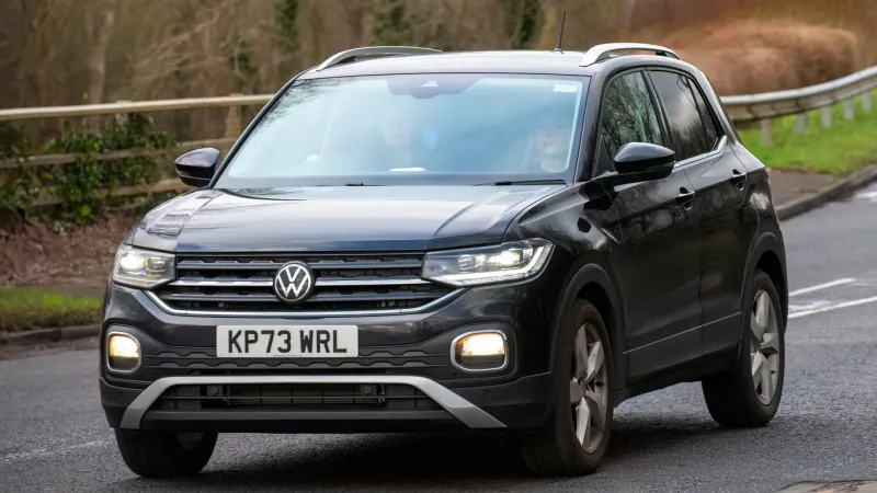 milton keynes,uk-feb 3rd 2024 2023 volkswagen t-cross car driving on an english road