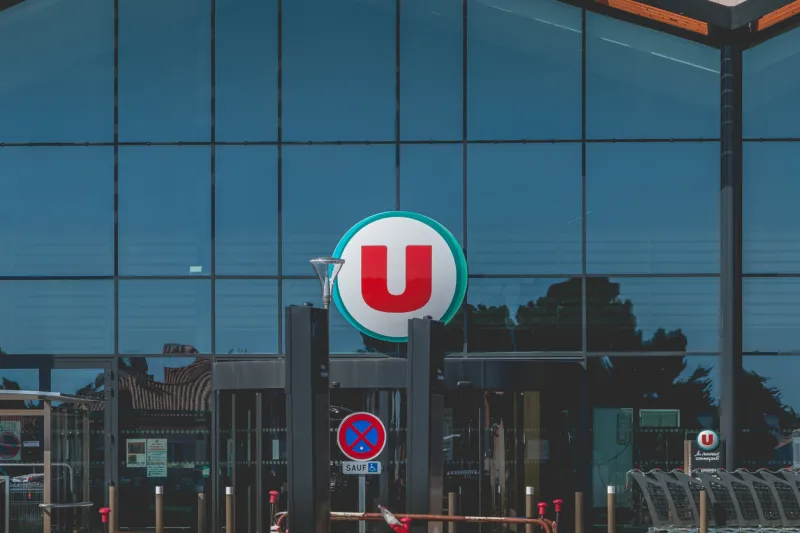 bretignolles sur mer, france - july 31, 2016  view of the entrance of a super u store, a supermarket dependent on a cooperative of french retailers