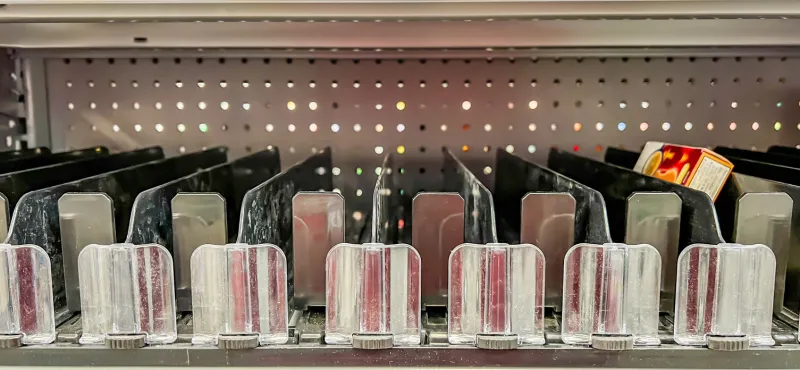 cold and flu season empty medicine shelves at a retail store high quality photo