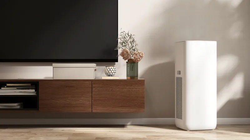 white modern design air purifier, dehumidifier on parquet floor in beige brown wall living room by wooden tv cabinet in sunlight from window fresh air, healthcare, health technology background 3d