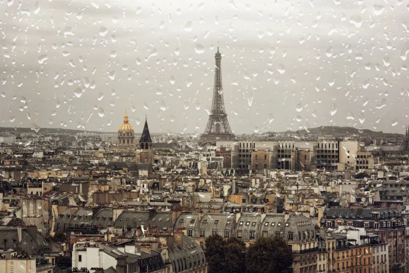 rain in paris, eiffel tower in autumn day, rainy day over the city