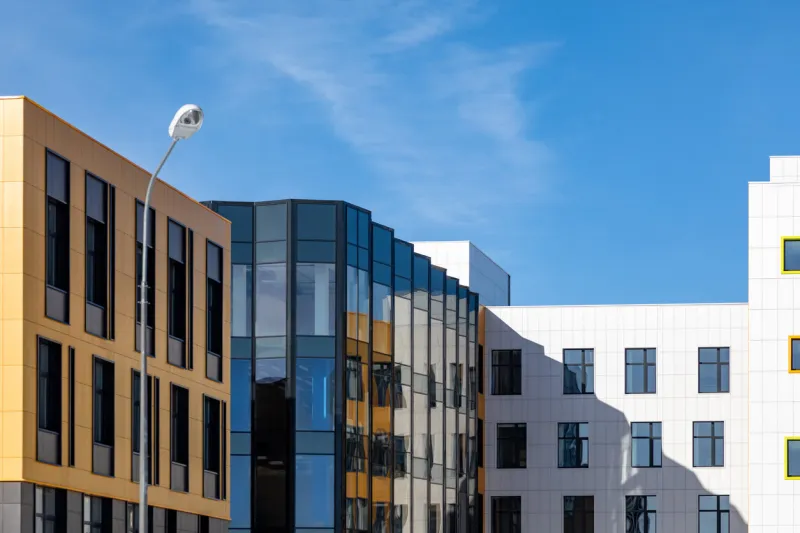 a fragment of an urban neighbourhood with low-rise office buildings, commercial real estate of typical design