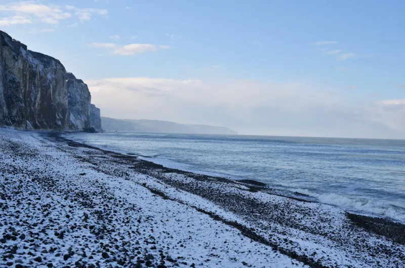 snow on a beach in dieppe, normandy, france