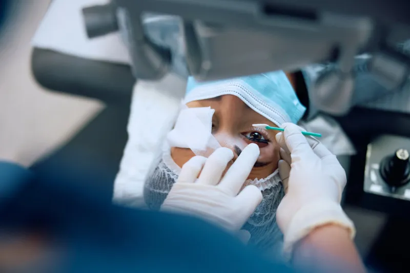 close up of woman during eye laser surgery at ophthalmology clinic