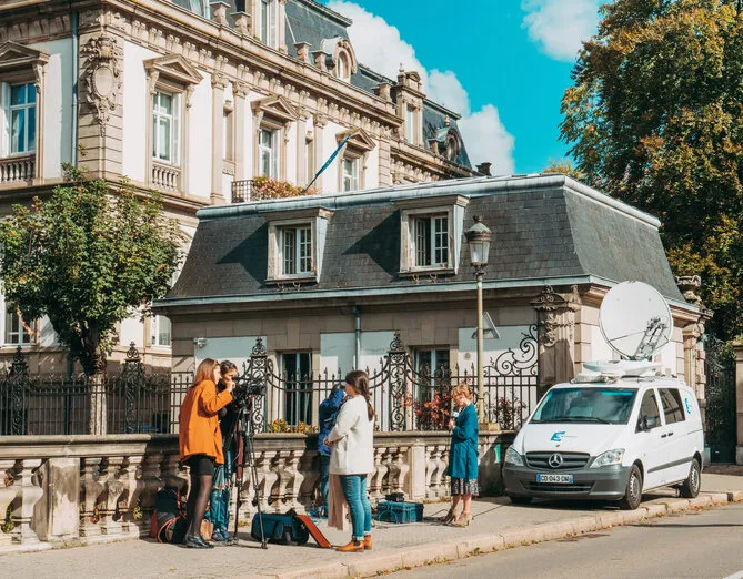 strasbourg  france 3 alsace reporters preparing to transmit live from the street of strasbourg near the residence of secretary general of the council of europe