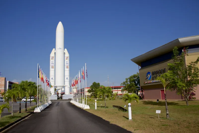 ariane 5 rocket mockup greets visitors at the entrance to the jupiter center in kourou, french guiana