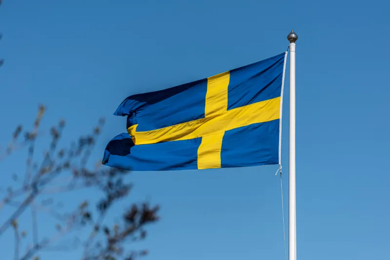 swedish flag on a flag pole