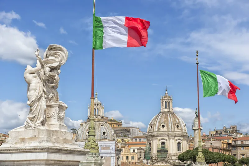 vittoriano in rome altar of the fatherland waving flags
