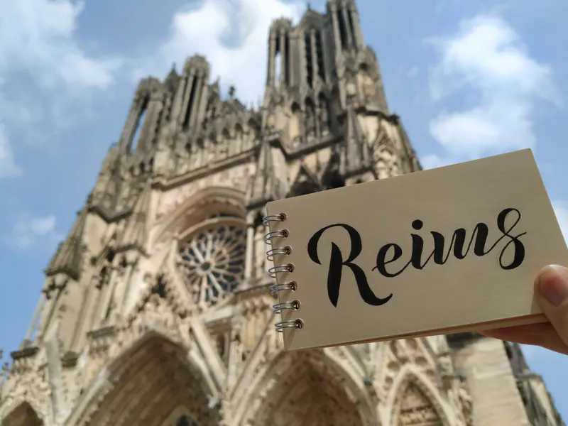 cathedral of notre-dame of rheims, reims, champagne-ardenne, france it is the seat of the archdiocese of reims, where the kings of france were crowned view with calligraphic inscription reims