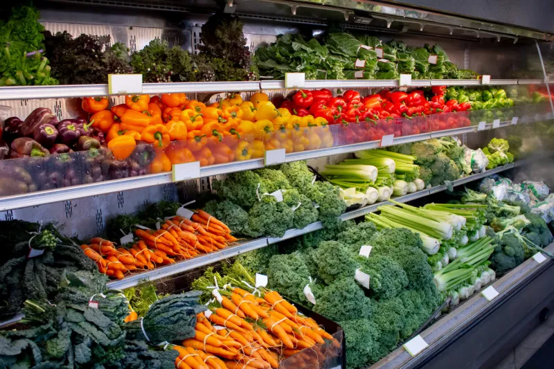 a view of a fresh vegetable display at a local grocery store