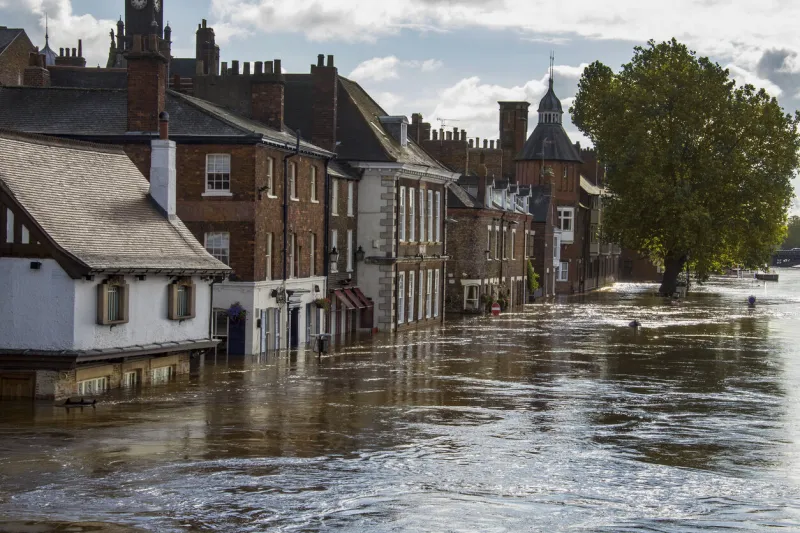the river ouse overflows and floods the streets of central york in the united kingdom