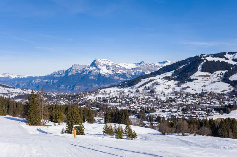 this landscape photo was taken in europe, in france, rhone alpes, in savoie, in the alps, in winter you can see l aup de véran, the tete du colonney, the aiguille rouge and from varan to megeve, under the sun