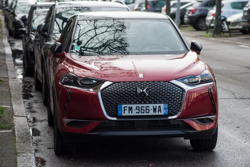 strasbourg - france - 4 february 2021 - front view of red citroen ds3 suv car parked in the street