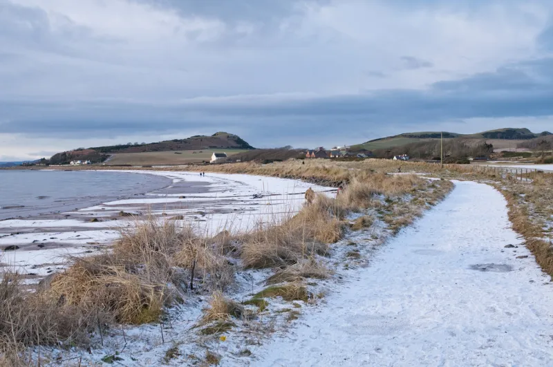 ardneil bay and shore path covered in snow, ayrshire, scotland