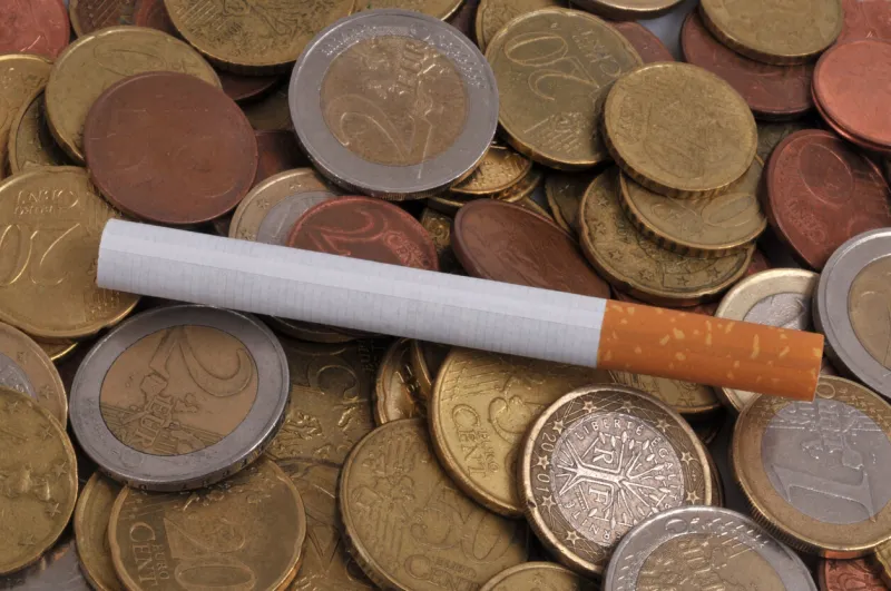cigarette on euro coins background