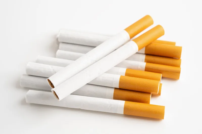 cigarette on us dollar banknotes, cost, trading, marketing and production, no smoking, import export