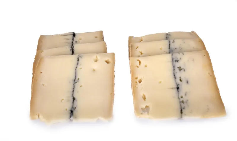 morbier cheese in front of white background